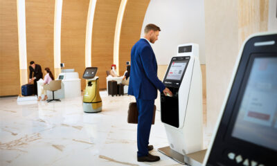 emirates just unveiled the world's first robot check-in assistant